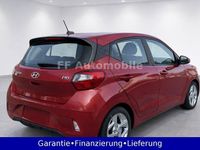 Gebraucht Hyundai i10 Trend 67 PS (49 kW) 2022 Dragon red / met Kleinwagen