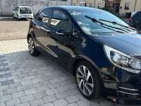 Gebraucht Kia Rio Attract 84 PS (61 kW) 2014 Schwarz Limousine