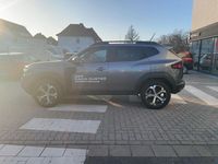 Gebraucht Dacia Duster Journey 131 PS (96 kW) 2025 Dolomitgrau (grau) (grau) SUV