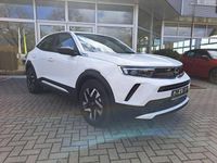 Gebraucht Opel Mokka-e Elegance 100 kW (136 PS) 2024 Lack weiss banquise/typ aussen SUV