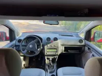 Second-hand VW Caddy Maxi 105 CP (77 kW) 2009 Roșu Monovolum