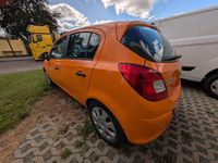 Gebraucht Opel Corsa Edition 69 PS (50 kW) 2012 Orange Kleinwagen