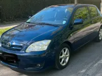 Używany Toyota Corolla 97 KM (71 kW) 2005 Niebieski Hatchback