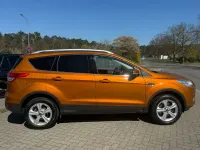 Używany Ford Kuga Titanium 150 KM (110 kW) 2016 Pomarańczowy SUV