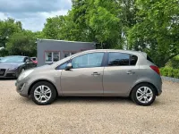 Brugt Opel Corsa Satellite 101 HK (74 kW) 2011 Brun Hatchback