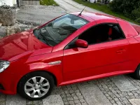 Używany Opel Tigra 90 KM (66 kW) 2005 Czerwony Kabriolet