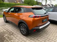Gebraucht Peugeot e-2008 Active 100 kW (136 PS) 2022 Orange SUV