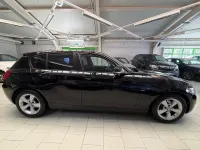 Używany BMW 116 Performance 136 KM (100 kW) 2012 Czarny Hatchback