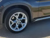 Używany BMW X1 143 KM (105 kW) 2014 Brązowy SUV