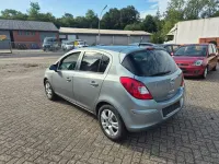 Gebraucht Opel Corsa Active 87 PS (63 kW) 2013 Silber Kleinwagen