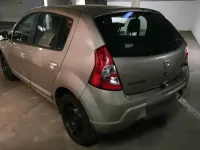Używany Dacia Sandero 90 KM (66 kW) 2011 Beżowy Sedan/Limuzyna