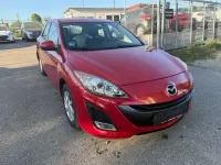 Używany Mazda 3 Prime-Line 105 KM (77 kW) 2011 Czerwony Hatchback