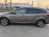 Gebraucht Ford Focus 101 PS (74 kW) 2014 Braun Kombi