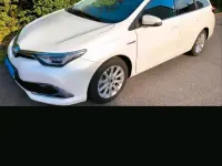Gebraucht Toyota Auris Hybrid 99 PS (72 kW) 2015 Weiß Kombi