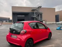 Gebraucht Toyota Aygo 68 PS (50 kW) 2013 Rot Kleinwagen