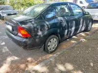 Używany Ford Focus 101 KM (74 kW) 1999 Czarny Sedan/Limuzyna