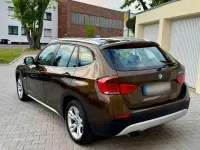 Gebraucht BMW X1 258 PS (189 kW) 2009 Braun SUV