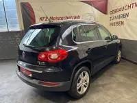 Używany VW Tiguan Team 170 KM (125 kW) 2011 Czarny SUV