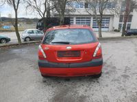 Gebraucht Kia Rio 97 PS (71 kW) 2009 Rot Limousine