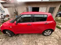 Gebraucht Suzuki Swift 75 PS (55 kW) 2009 Rot Kleinwagen