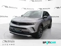 Gebraucht Opel Mokka Elegance 131 PS (96 kW) 2021 Kontrast grau/quarz silber SUV