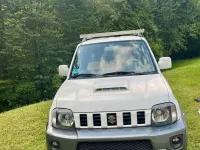 Gebraucht Suzuki Jimny 86 PS (63 kW) 2013 Weiß SUV