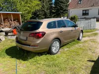 Gebraucht Opel Astra 165 PS (121 kW) 2013 Gold Kombi