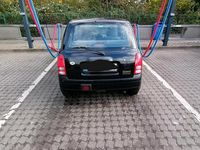 Gebraucht Daihatsu Cuore 56 PS (41 kW) 2002 Schwarz Kleinwagen