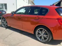 Gebraucht BMW 118 Advantage 140 PS (102 kW) 2018 Orange Kleinwagen