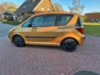 Gebraucht Peugeot 1007 65 PS (47 kW) 2006 Orange Van / Kleinbus
