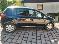 Używany Opel Corsa Selection 87 KM (63 kW) 2010 Czarny Hatchback