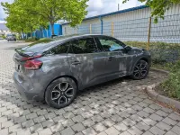 Używany Citroën e-C4 100 kW (136 KM) 2024 Szary Sedan/Limuzyna