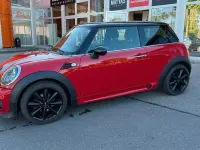 Gebraucht Mini John Cooper Works Chili 122 PS (89 kW) 2011 Chili (solar) red Kleinwagen