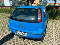 Używany Opel Corsa 75 KM (55 kW) 2004 Niebieski Hatchback