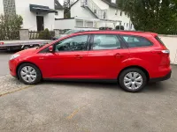 Używany Ford Focus Trend 125 KM (91 kW) 2012 Czerwony Kombi