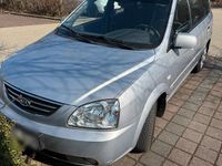 Gebraucht Kia Carens 140 PS (102 kW) 2006 Silber Van / Kleinbus