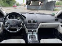 Second-hand Mercedes C180 Elegance 156 CP (114 kW) 2010 Negru Break