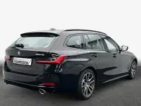 Second-hand BMW 320e 204 CP (150 kW) 2022 Negru Break