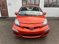 Gebraucht Toyota Aygo Basis 68 PS (50 kW) 2012 Orange Kleinwagen
