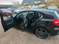 Usado BMW 116 122 CV (89 kW) 2011 Negro Utilitario