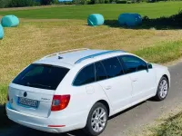 Używany Skoda Superb Ambition 170 KM (125 kW) 2012 Biały Kombi