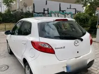 Gebraucht Mazda 2 75 PS (55 kW) 2010 Weiß Kleinwagen