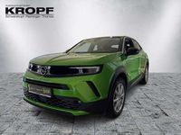 Gebraucht Opel Mokka-e Elegance 100 kW (136 PS) 2023 Lackierung matcha green/typ au SUV
