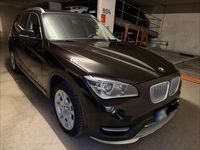 Używany BMW X1 Advantage 143 KM (105 kW) 2014 Brązowy SUV