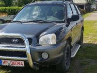 Gebraucht Hyundai Santa Fe GLS 145 PS (106 kW) 2002 Ebony black+cool gra SUV