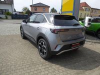 Gebraucht Opel Mokka-e Ultimate 100 kW (136 PS) 2023 Kontrast grau metallic SUV