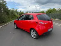 Gebraucht Mazda 2 68 PS (50 kW) 2009 Rot Kleinwagen