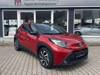 Gebraucht Toyota Aygo Pulse 72 PS (52 kW) 2024 Chili red / black mica Kleinwagen