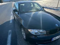 Gebraucht BMW 116 122 PS (89 kW) 2009 Schwarz Kleinwagen