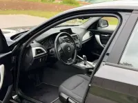 Second-hand BMW 116 136 CP (100 kW) 2015 Negru Hatchback